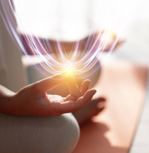 side-view-adult-meditating-with-light
